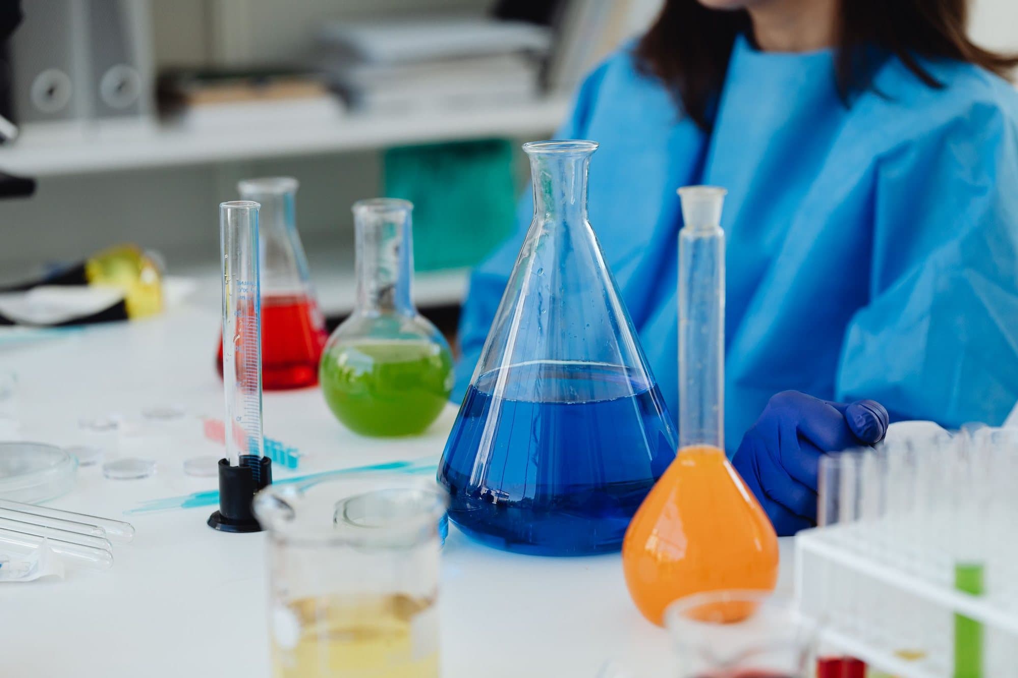 Laboratory flasks and samples on a test bench